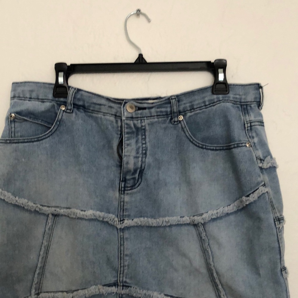 I have a cute jean skirt I’m selling with slits in the front.